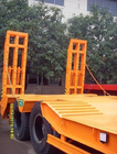 Economic 2 axles 30 tons semi Low Bed Trailer with heavdy duty steel spring ramps supplier
