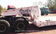 Best price 4 axle lowboy trailer for loading weight 100tons ，lowbed trailer with detachable gooseneck supplier