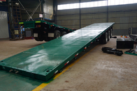 Titan tri-axle flatbed trailer factory,40 ft tri axle flatbed container semi trailer with 12sets locks supplier