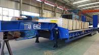 Customized tri axle 80 ton heavy low bed semi trailer for Algeria supplier