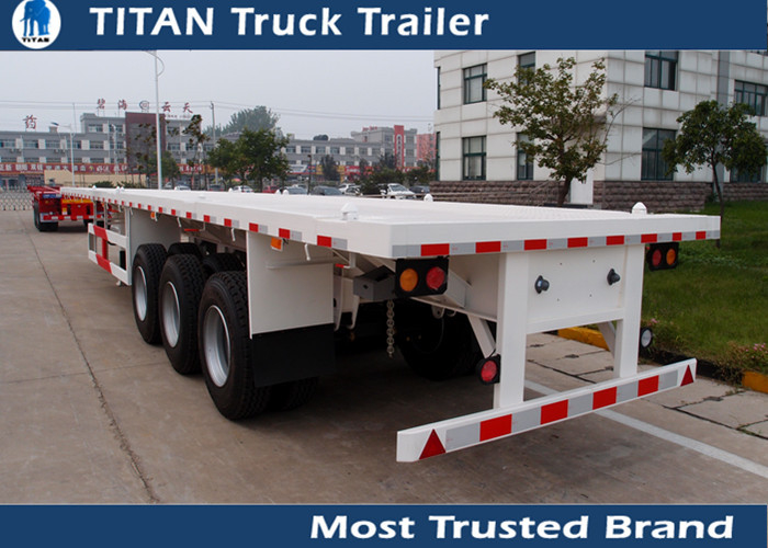 12,500*2,500*1,560 mm Flatbed semi trailer 40ft 3 axles transport containers supplier