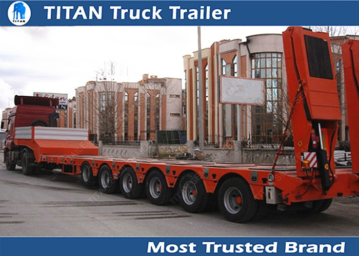 Hydraulic equipment 6 axle trailer lowbed , red drop bed low loader trailer supplier