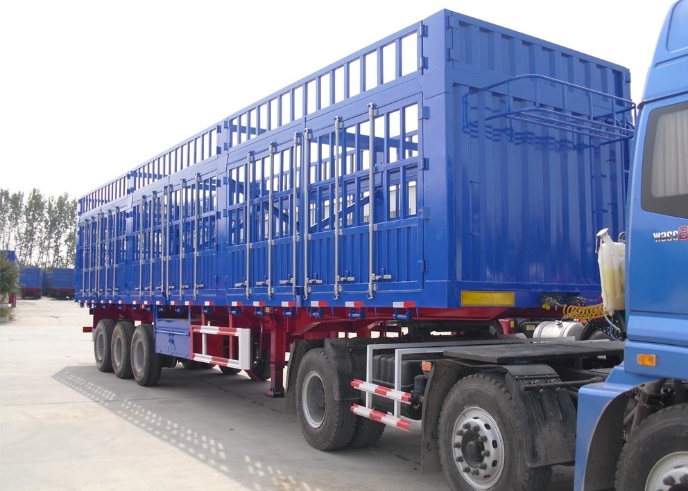 40 T Stake Cargo trailer with fence and 3 axles , flat bed trailer transport bulk cargo supplier